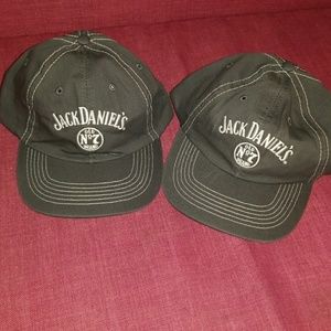 Pair of gray jack Daniels hats