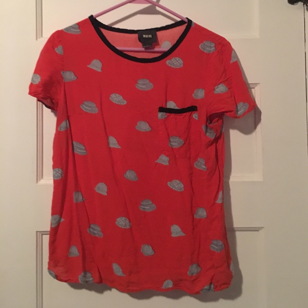 Anthropologie red hat motif top.