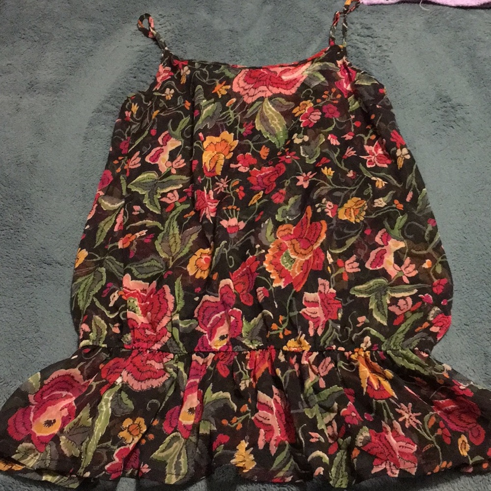 Sheer flower print shirt.