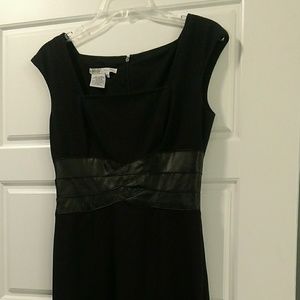 Black knit dress with leather band at waist