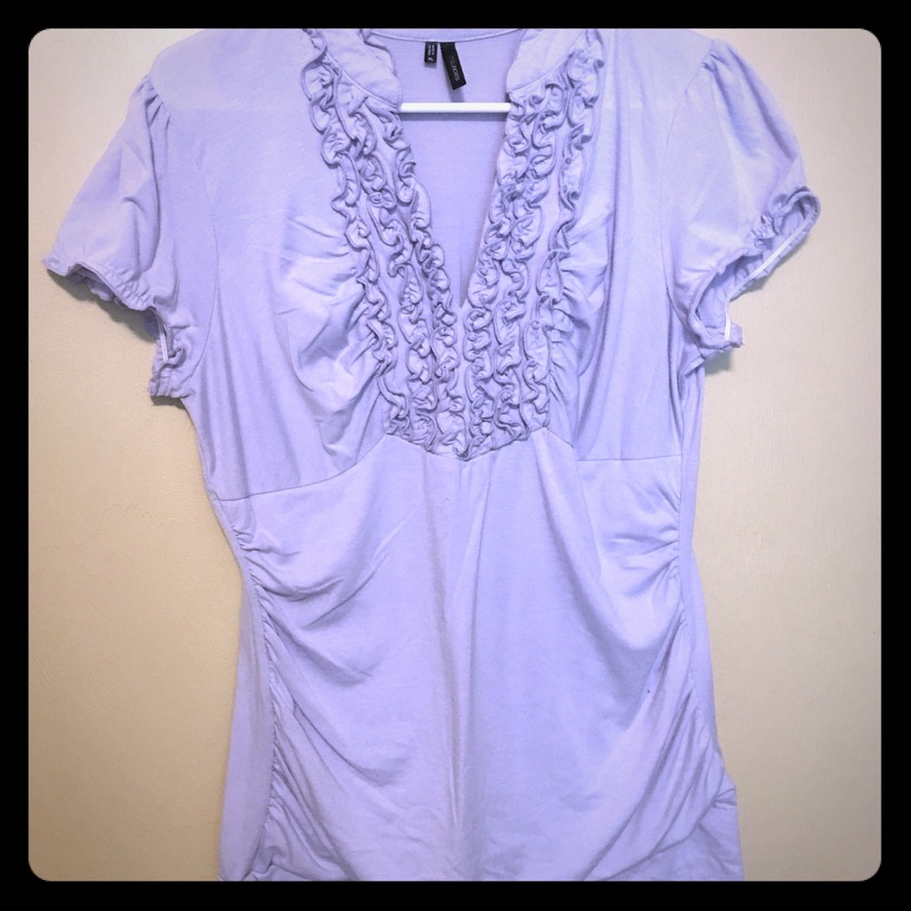 Lavender top with ruched sides.