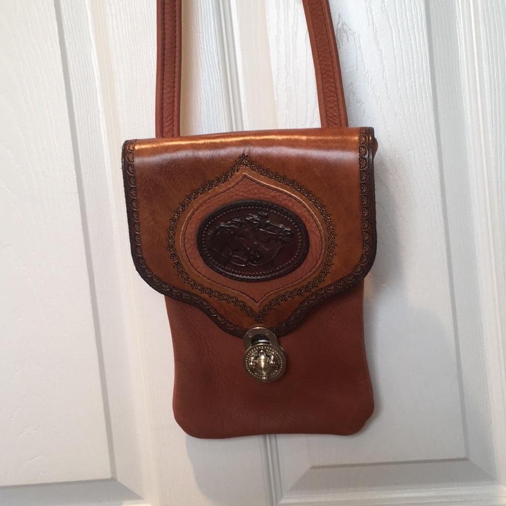 Leather cross body purse.