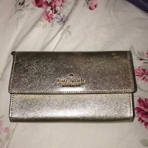 Kate spade gold cedar street phone wristlet