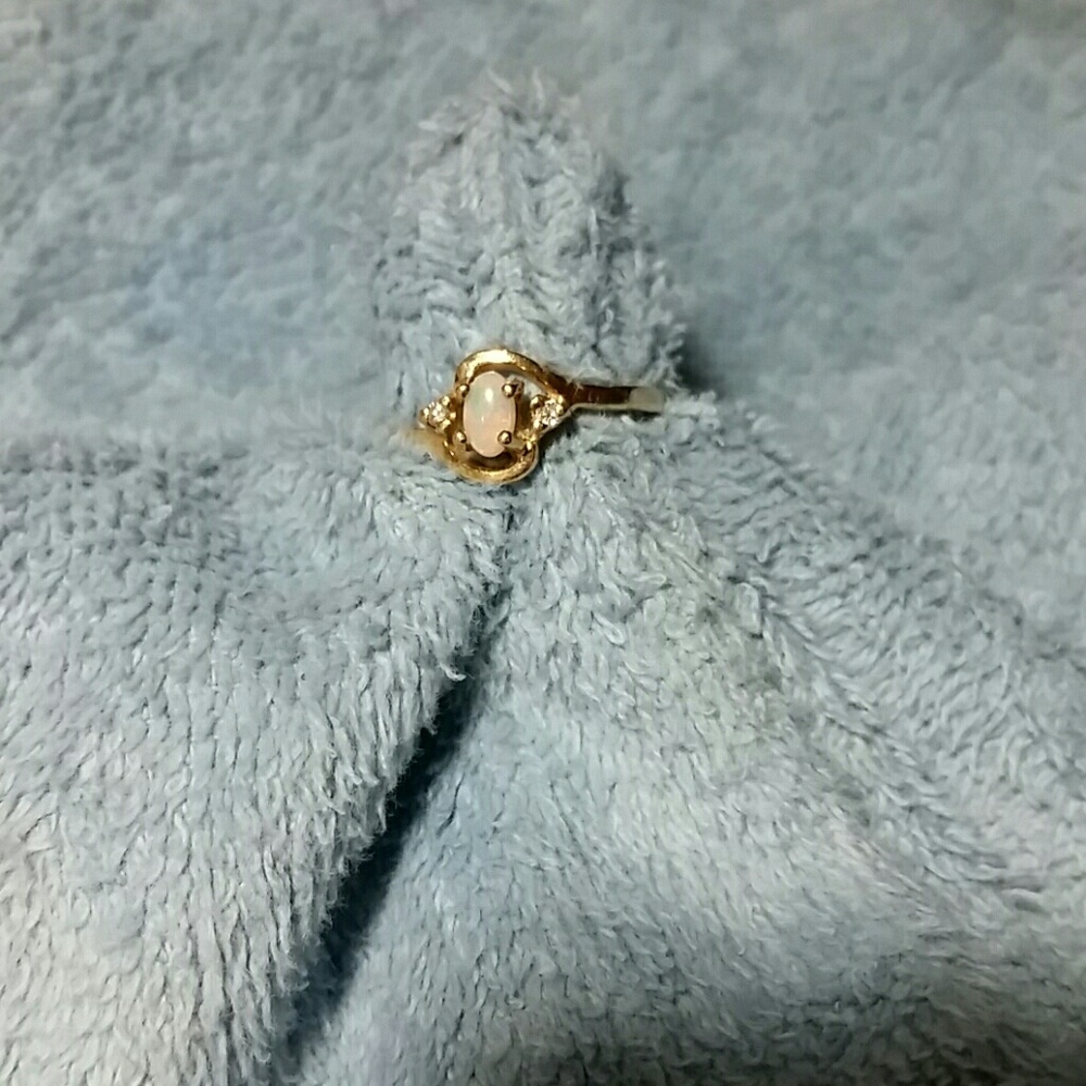 Black Hills Gold ring with opal and diamonds.