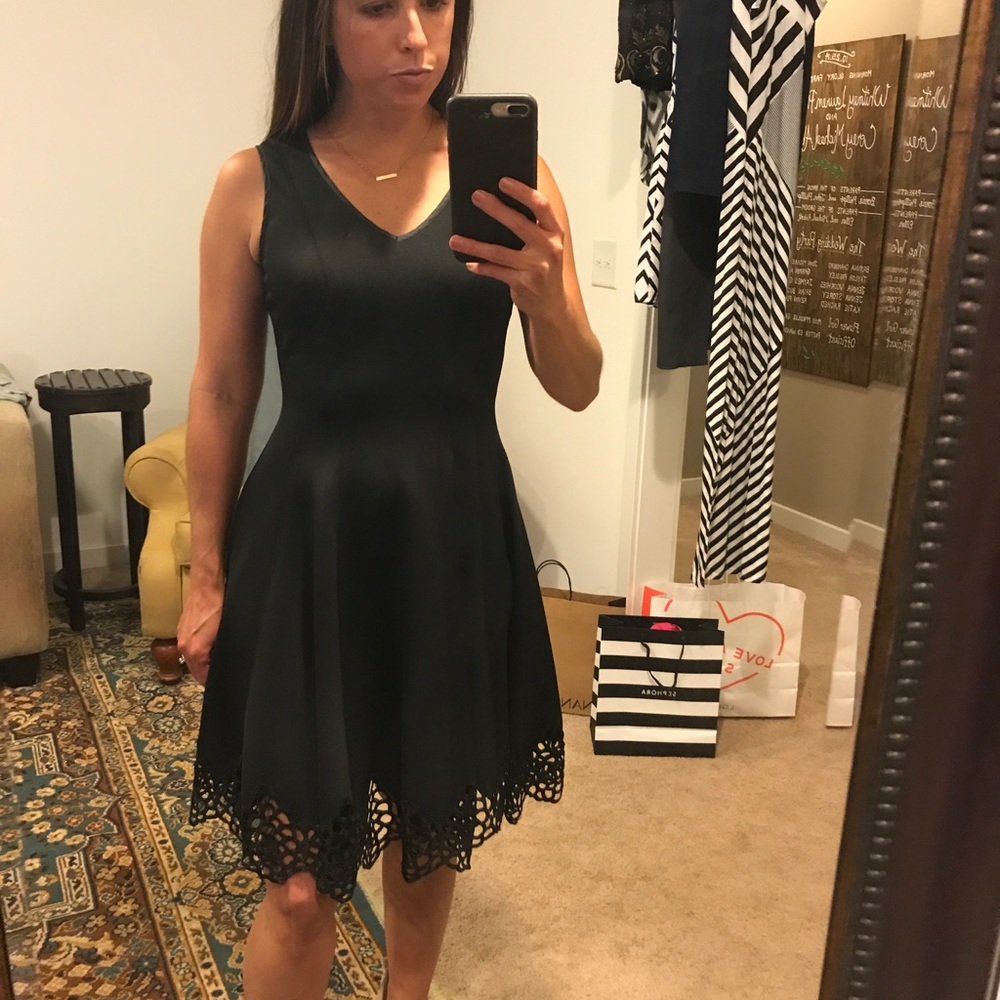 Slim black dress with lace detail