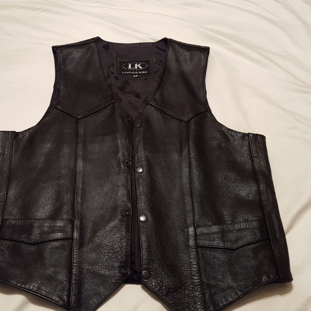 Leather vest.
