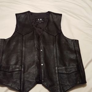 Leather vest.