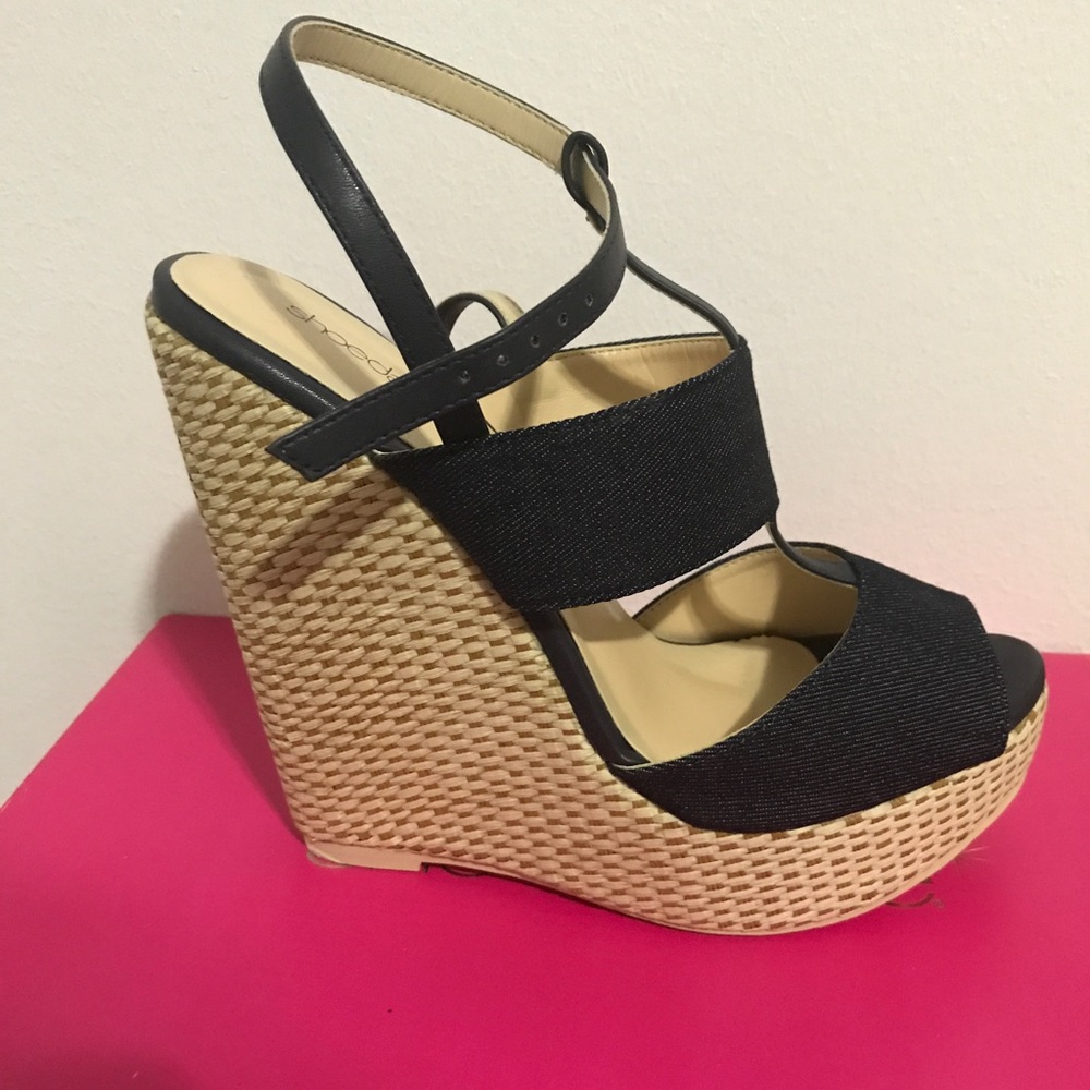 Really high wedges. Brand new. Denim and beige.
