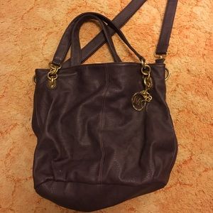Dark purple medium to large MK purse