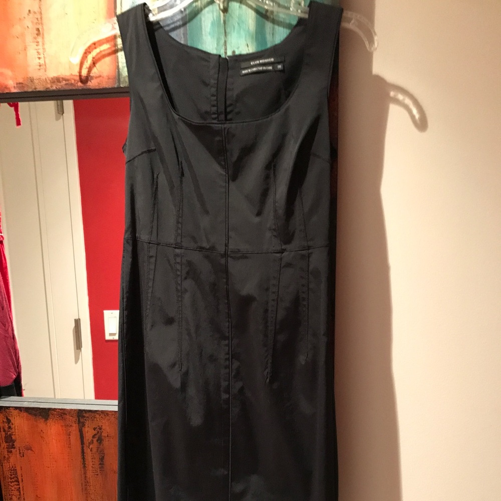 Sleek black dress sculpted detail