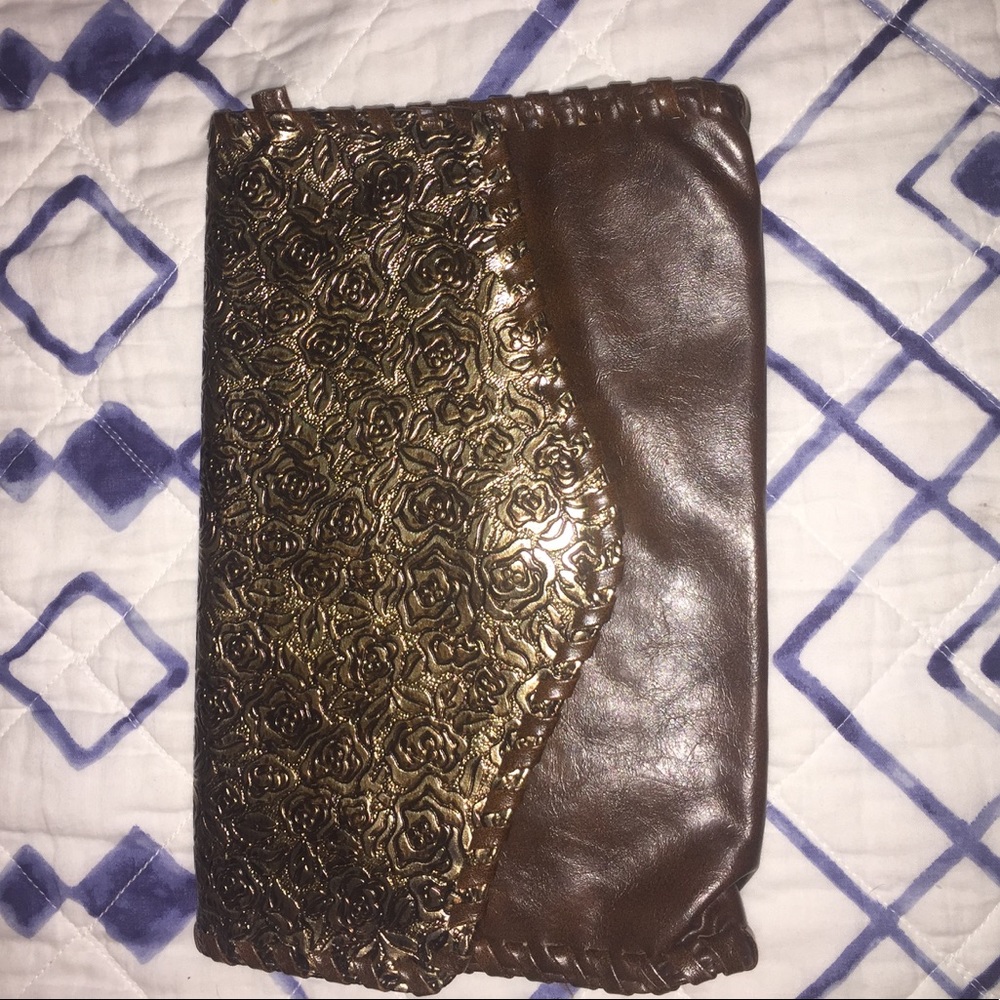 Brown clutch with floral detail
