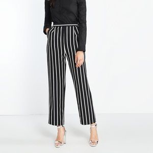 Black and white striped straight leg trousers