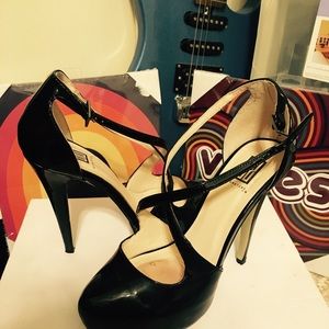 Signature black pumps.