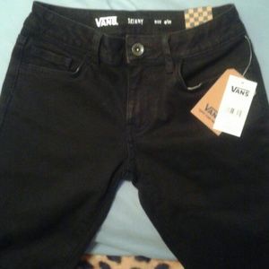 Vans destructed black skinny jeans