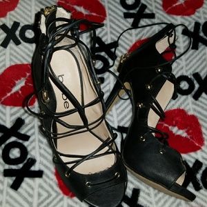 Black bebe lace up heels
