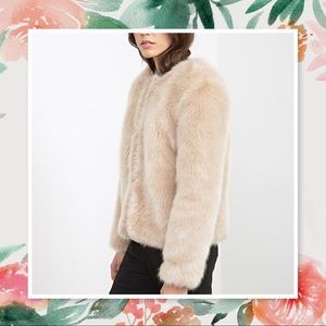 Forever 21 Faux Fur Jacket in Cream. Zipper closer