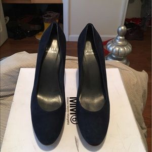 Blue sued slightly worn shoes