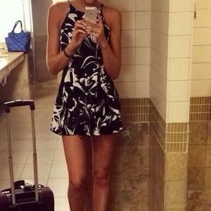 Black and white floral pleated romper