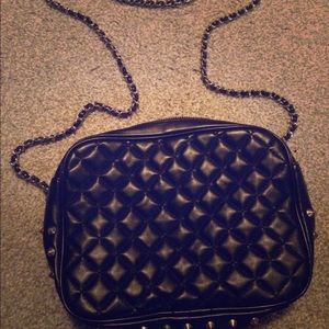 Black spiked bag