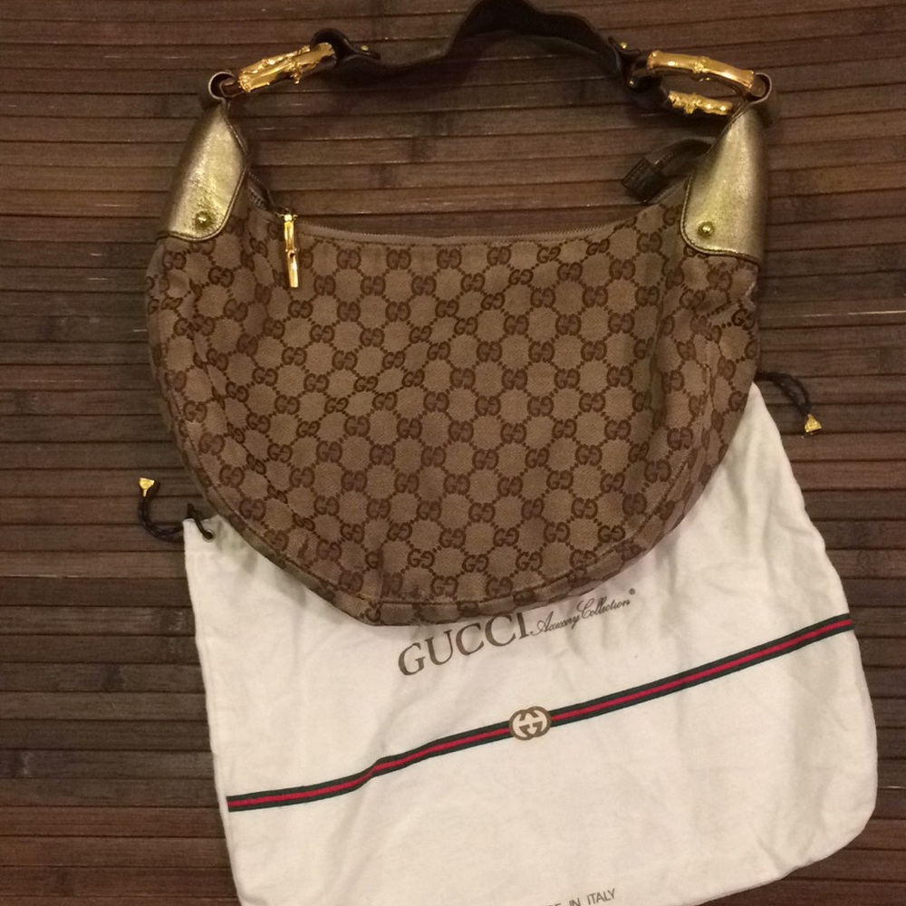Authentic Gucci hobo bag gold leather strap