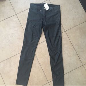 H&M black leather coated jeans.