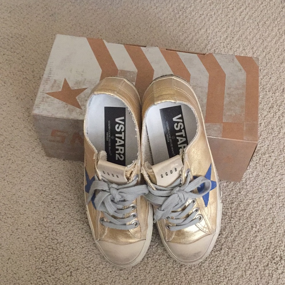 Golden Goose gold sneakers