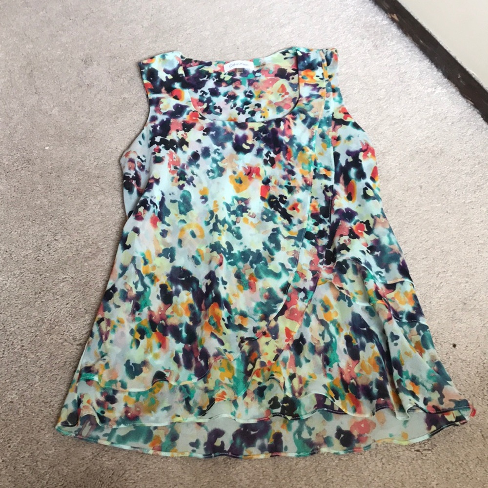 CK sleeveless dress shirt, multi-colored.
