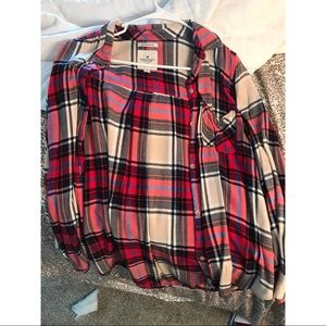 Two American Eagle flannels