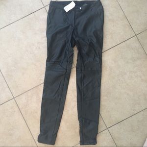 H&M Leather coated black denim. New with tag.