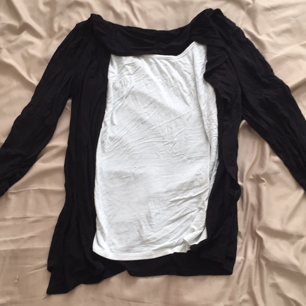 One-piece shirt w/ attached lay over. Never worn.