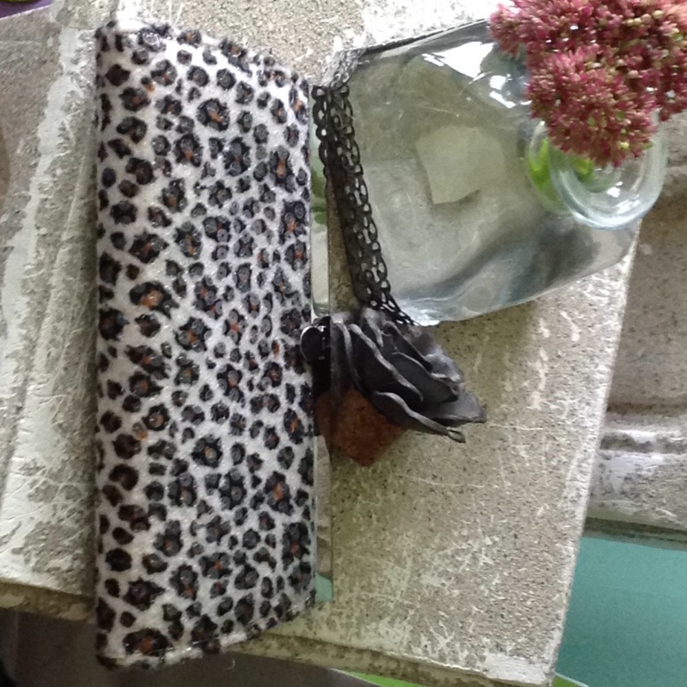 Animal print sequence clutch