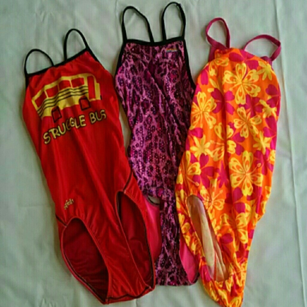 Swim suits (three)