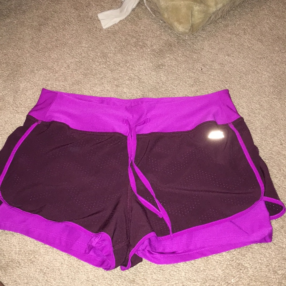 SOLDAvia athletic shorts size M built in spandex