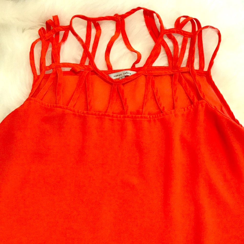 Bright orange top