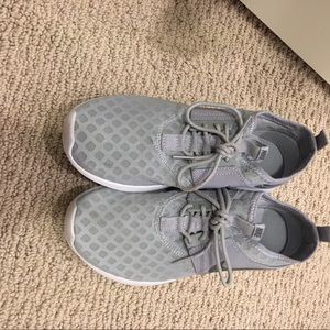 Nike juvenate sneakers barely worn. Look new