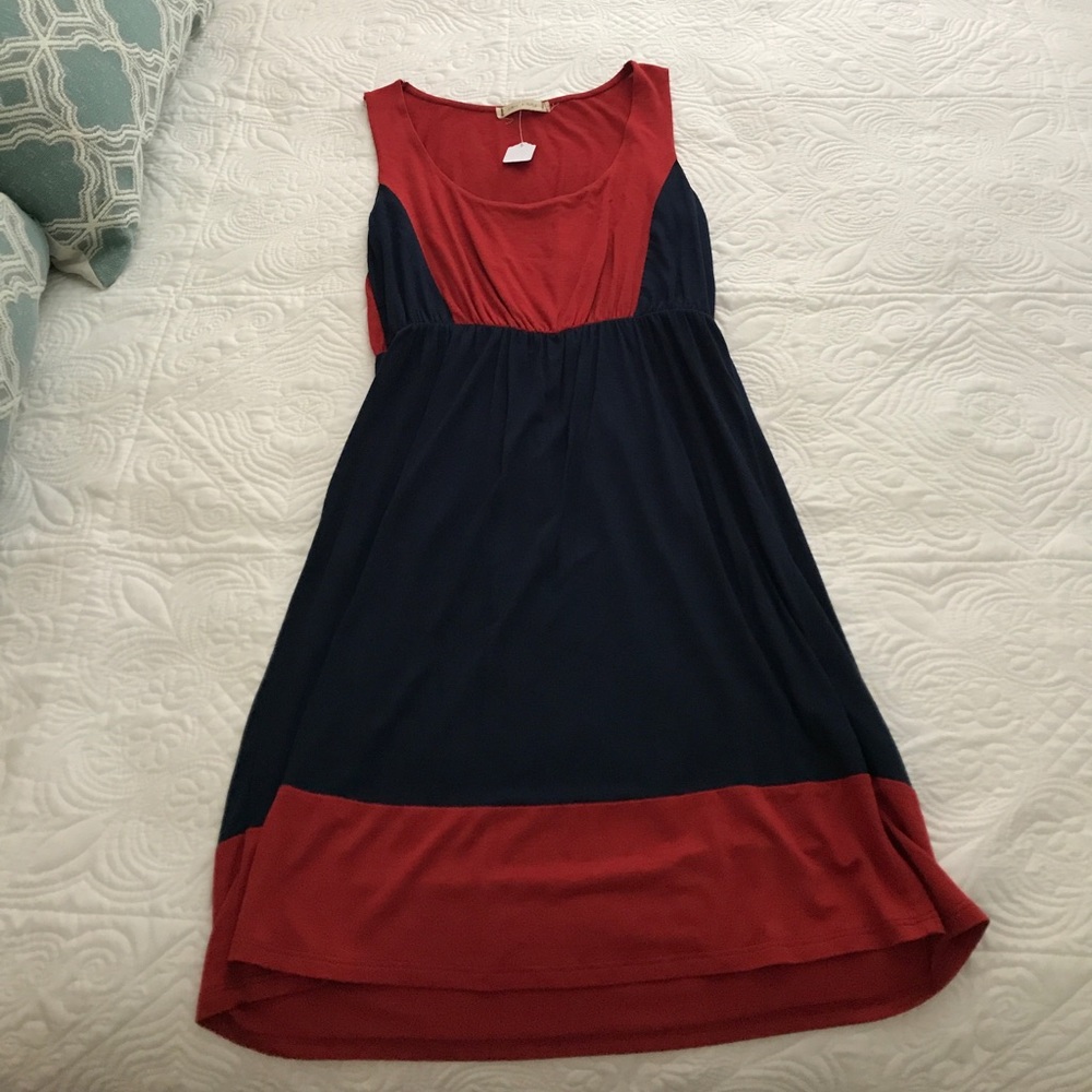 Game day dress. Never worn with tags. Size small