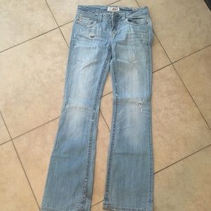 MEK bootcut lightwash denim with flap pockets.