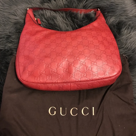 gucci bag embossed logo