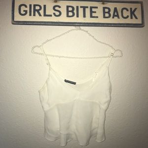 Brandy Melville white tank top. V cut flowy