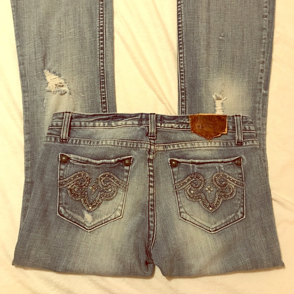 Distressed flare jeans