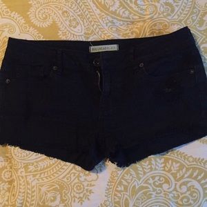 Black denim shorts