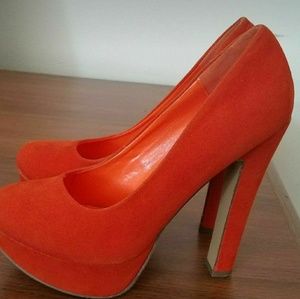 Orange pumps