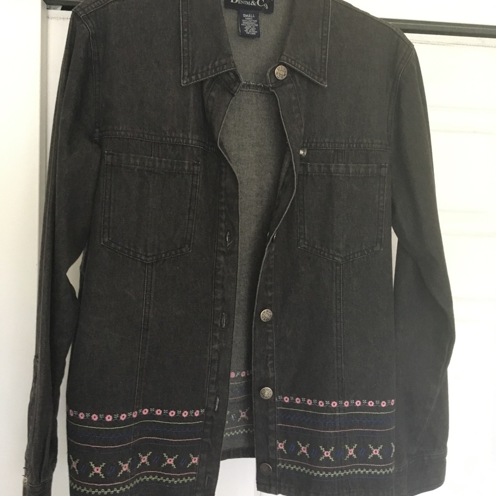 Dark jean jacket with floral pattern