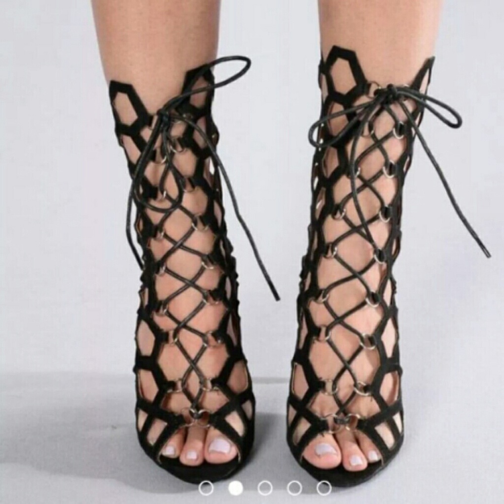 Caged bootie lace up heel