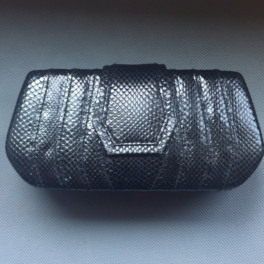 Black snakeskin clutch