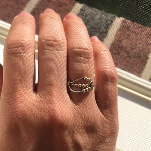 Dainty silver and gold spinner bead ring. Size 6