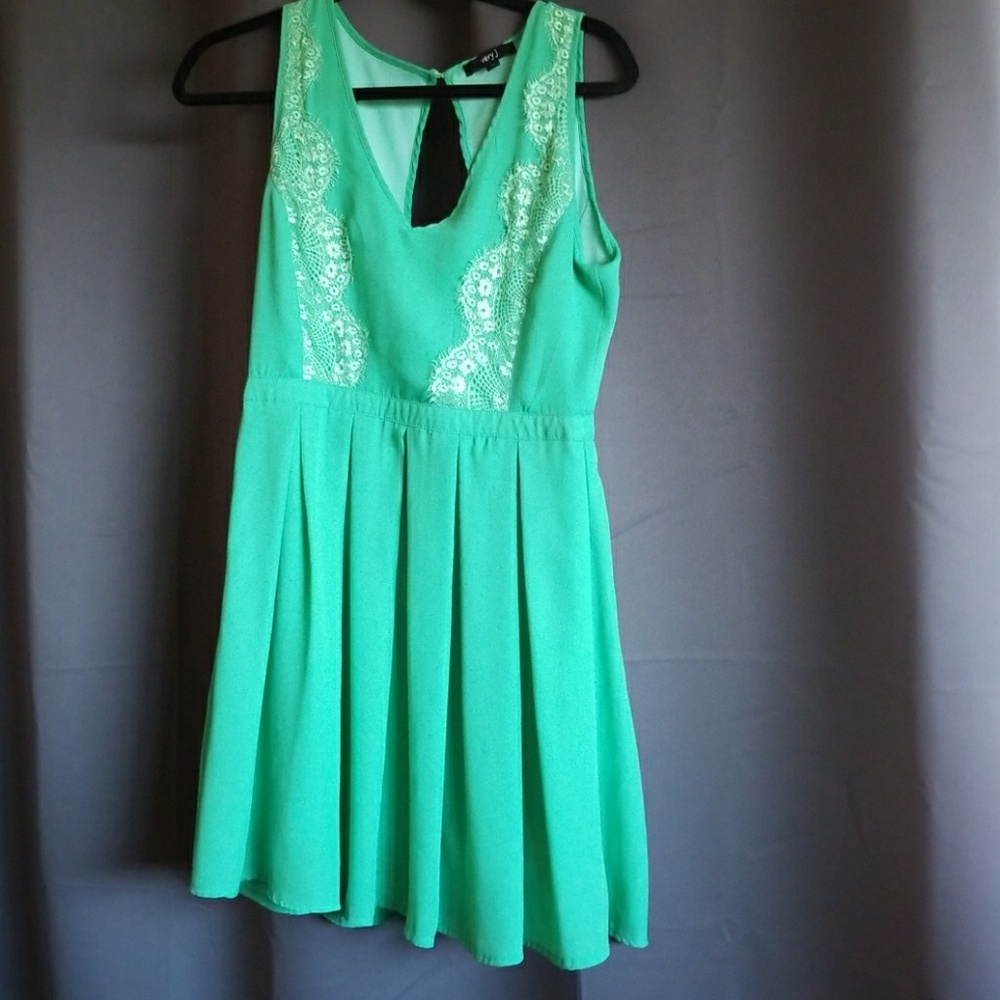 Green open back tank dress with lace detail