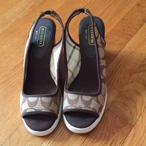 pair of coach heels sandals