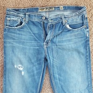 Mens Buckle blue jeans.
