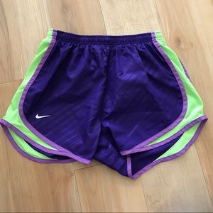 Purple and lime green Nike Tempo shorts